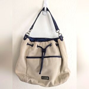 COACH BUCKET CREAM/NAVY LEATHER TRIM HOBO BAG.